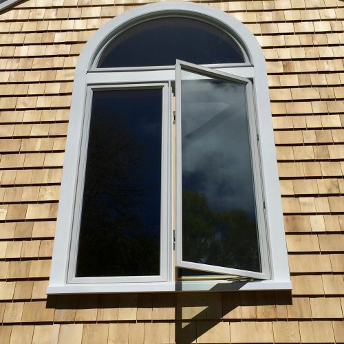 Exterior Arched Window-Trim replacment (after)