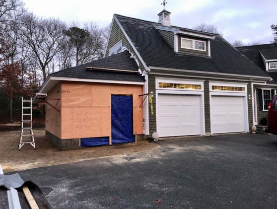 Home garage addition sheathed exterior completed