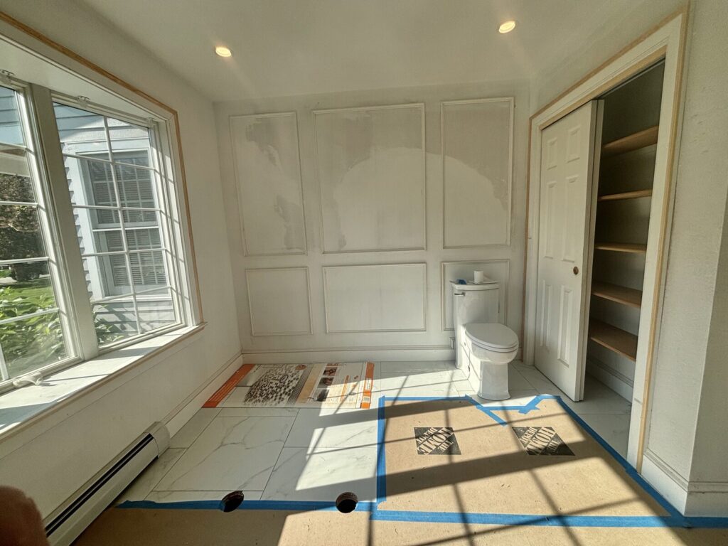 Bathroom remodel with new paneling and accent
