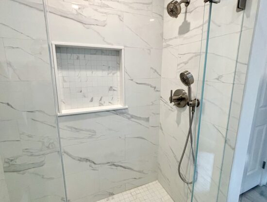 Kingston guest bathroom remodel with tile installation lining up the veining