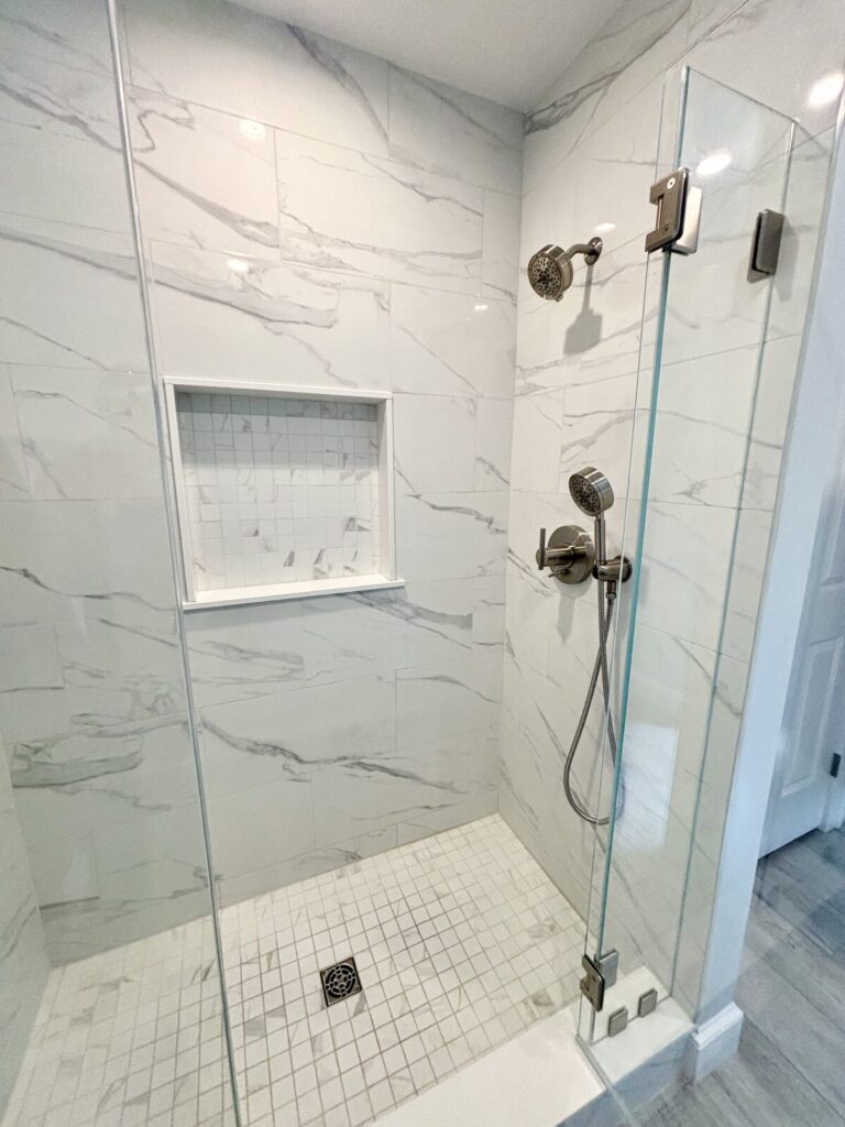 Kingston guest bathroom remodel with tile installation lining up the veining